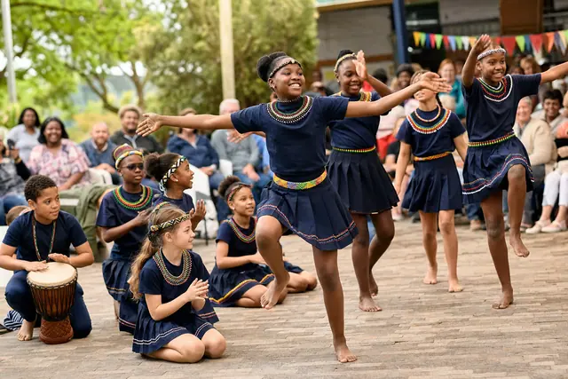 Learners performing at a cultural celebration